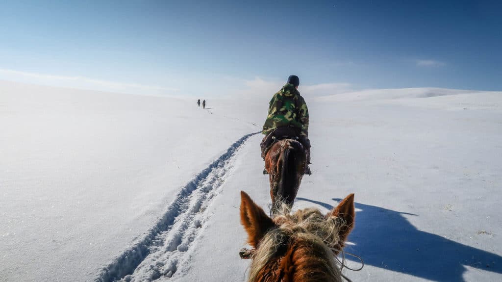 Kyrgyzstan Itinerary: The Ultimate 7, 10, 14 & 21-Day Travel Guide 13 Horse Riding to Song Kul Lake in winter - Journal of Nomads
