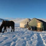 The Ultimate Travel guide for backpacking in Kyrgyzstan - Journal of Nomads - yurts in winter