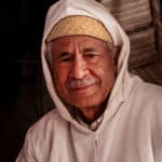 Portrait Moroccan man in village near Merzouga Morocco - Journal of Nomads