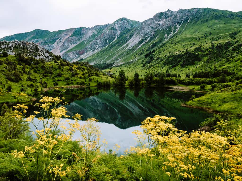 Why Visit Kyrgyzstan: 12 Reasons why I fell in love with this special country in Central Asia 12 Sary Chelek Lake Kyrgyzstan - Sary Chelek Travel Guide - Journal of Nomads