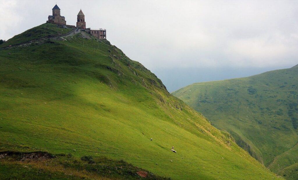 10 Beautiful Historical Places in Georgia (country) 7 Historic Places to visit in Georgia country- Kazbegi Trinity Church