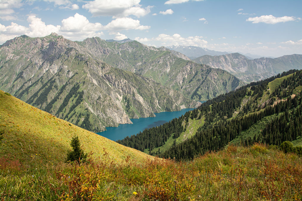 Why Visit Kyrgyzstan: 12 Reasons why I fell in love with this special country in Central Asia 31 Kyrgyzstan Horse Riding Tour Ashuu Pass Sary Chelek