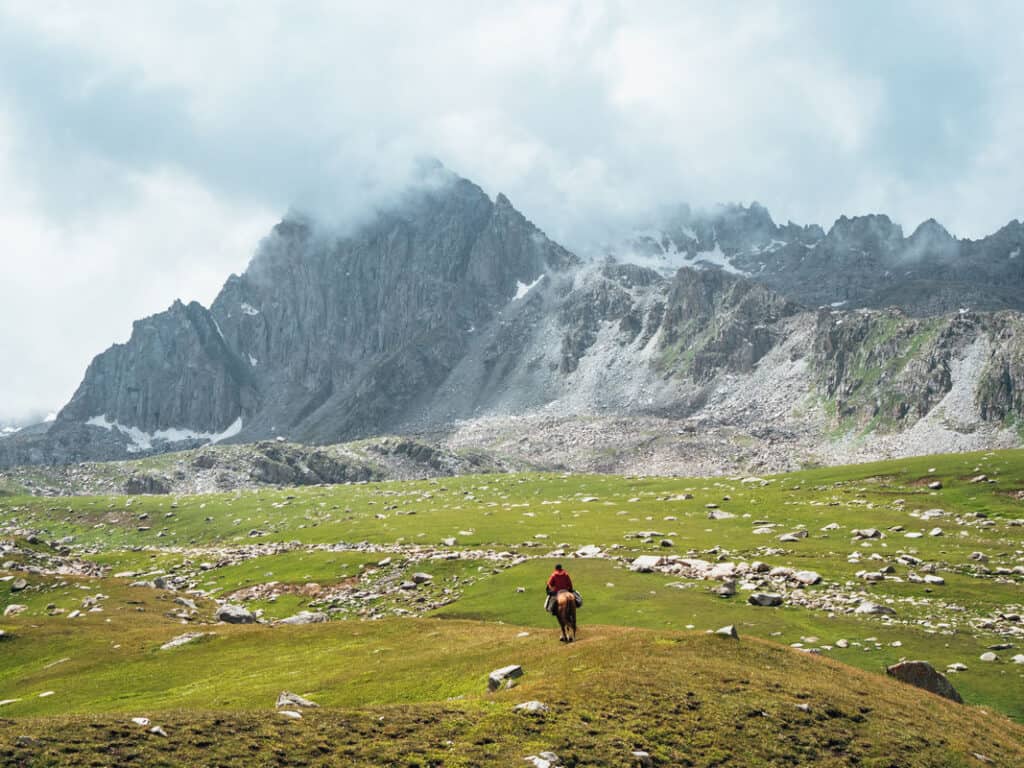Why Visit Kyrgyzstan: 12 Reasons why I fell in love with this special country in Central Asia 37 Chelpek Lakes - Zhashyl Kul - Ydryk Lakes - Horse Riding in Kyrgyzstan - Best destinations horseback trek Kyrgyzstan - Horse riding Karakol