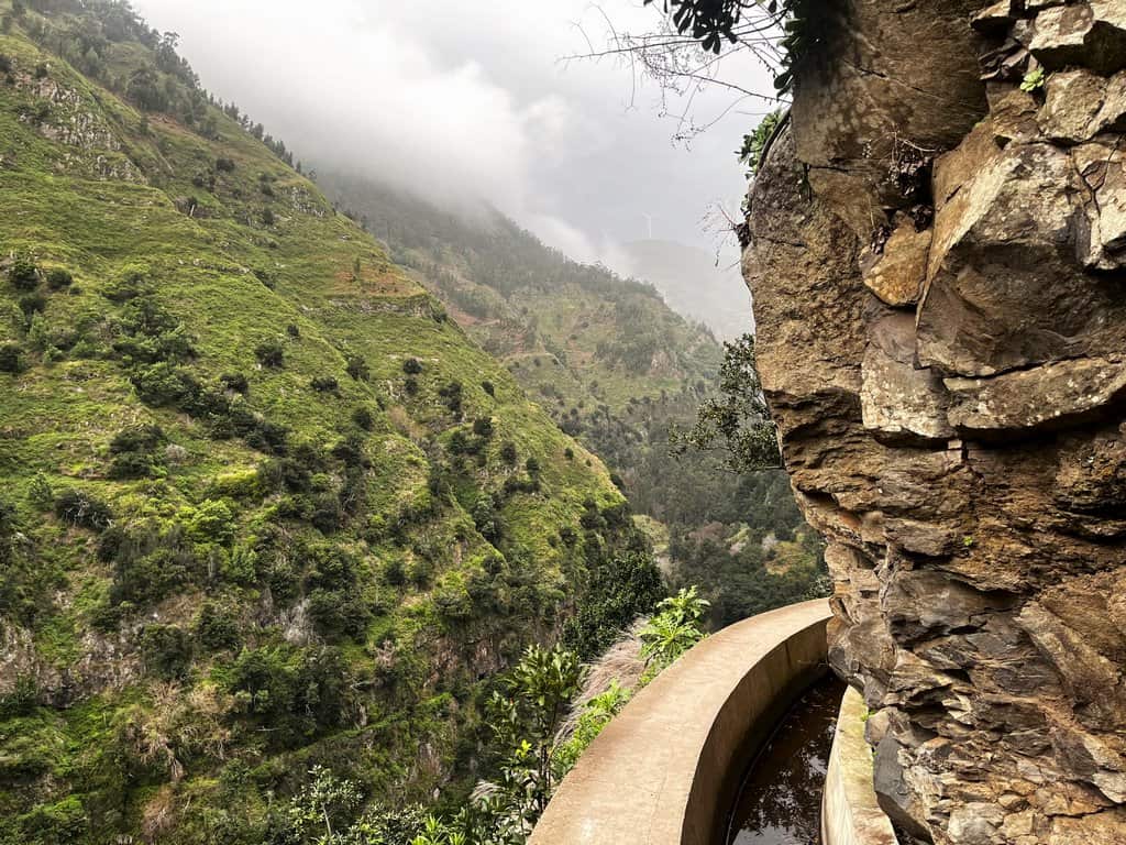 The Handy Guide to Hiking in Madeira Portugal with Our 7 favourite Madeira Hiking trails 57 Hiking in Madeira - Journal of Nomads. The trail from Levada do Moinho - Levada Nova winds under waterfalls and into forests.