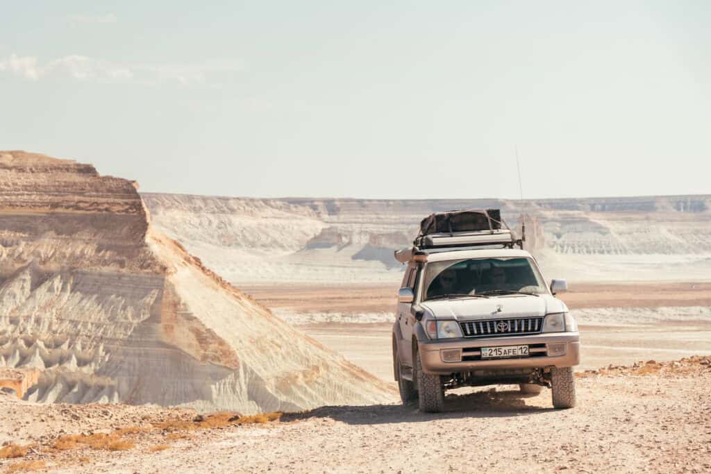 Mangystau Kazakhstan: Complete Travel Guide (2026) to Bozzhyra, Torysh, Sherkala & More 16 How to travel in Mangystau Travel Guide - - Do you need a 4x4 in MAngystau - HOw to get to Mangystau - Mangystau itinerary - Mangystau Kazakhstan - Journal of Nomads